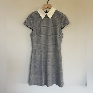 This is a plaid dress by Alice + Olivia that is double lined, and worn once